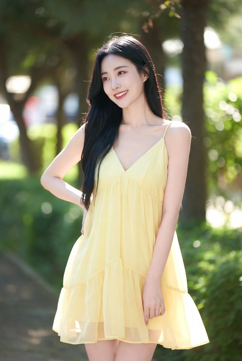 Korean woman wearing a light yellow sundress in a bright outdoor setting, styled for a cheerful daytime date.