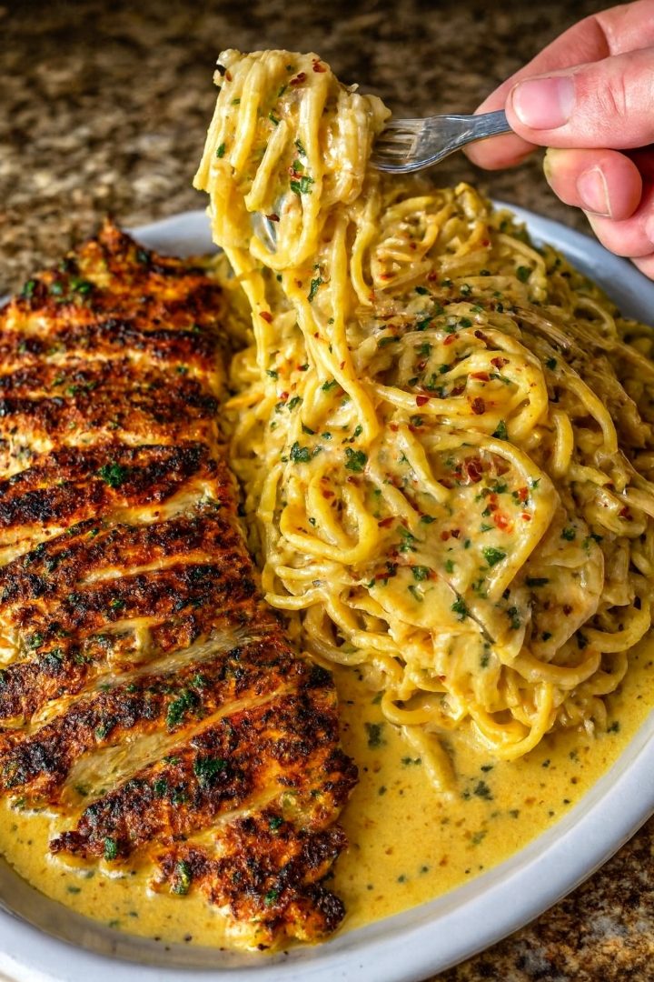 Garlic Parmesan Chicken Spaghetti in spicy Cajun cream sauce recipe 