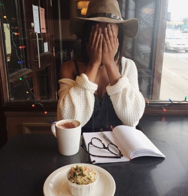 Woman starting her day with devotional prayer and coffee